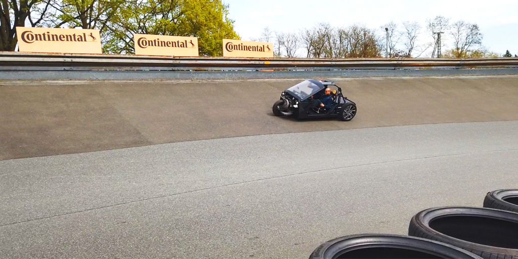 TWIKE 5 driving test vehicle undergoing track testing at the Continental test facility