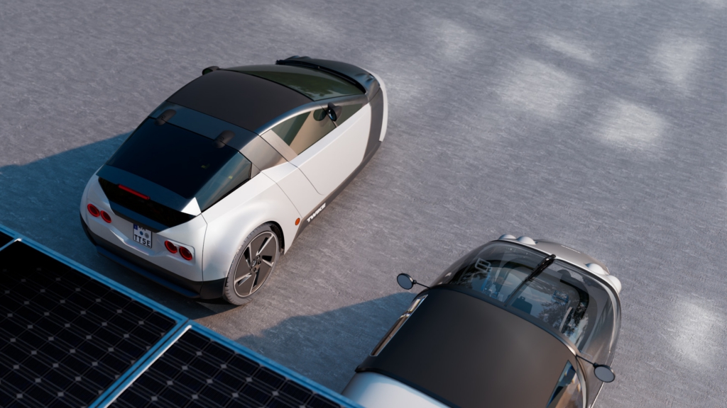 Side-by-side view of the TWIKE 5 and early solar-powered TWIKE 3 models.