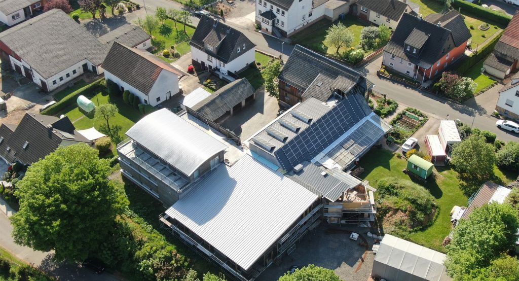 aerial view of twike hq in rosenthal germany. the building area is powered by their own solar panel grid