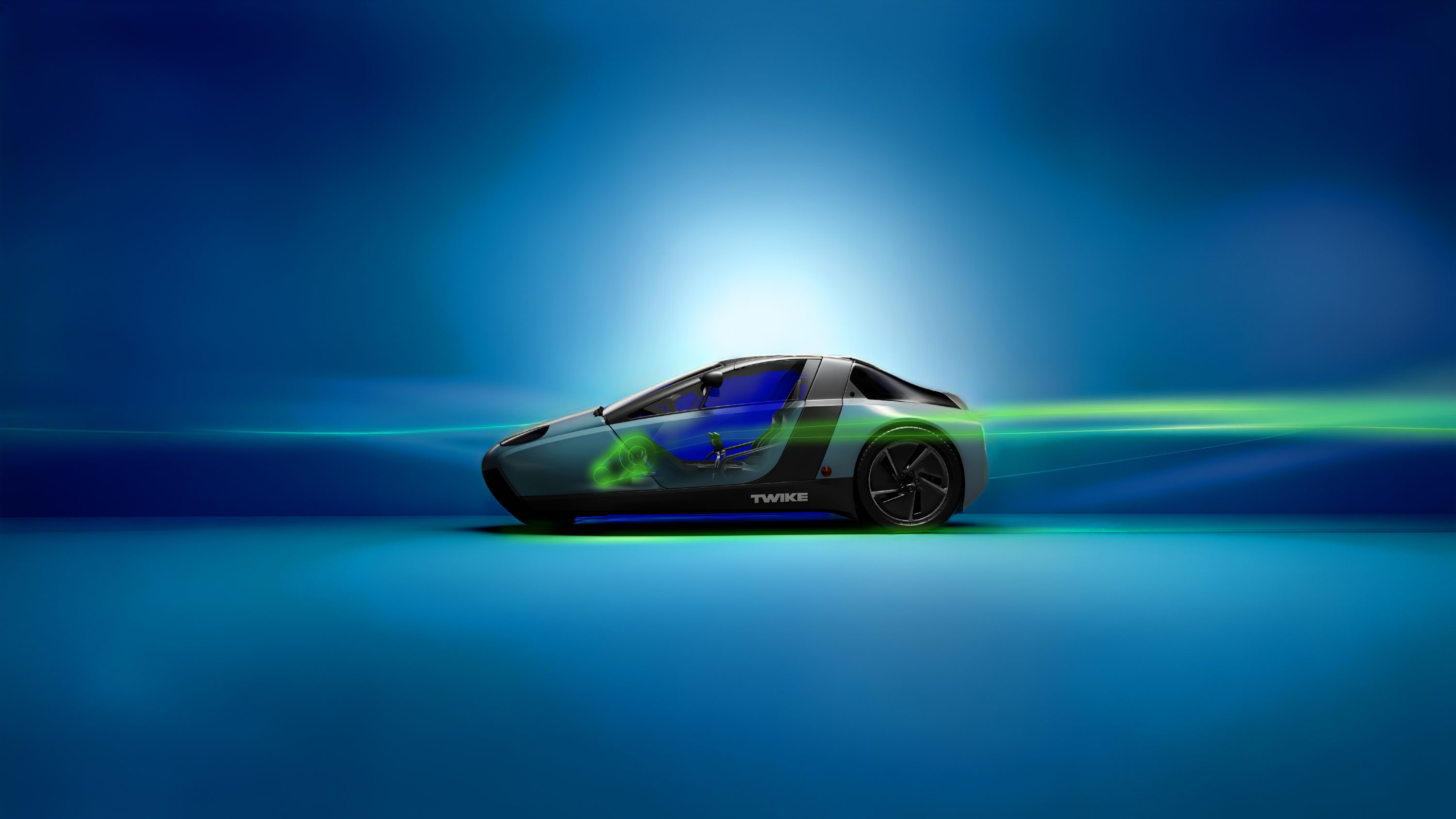 twike in a blue light studie showing the human power hybrid with pedal-system