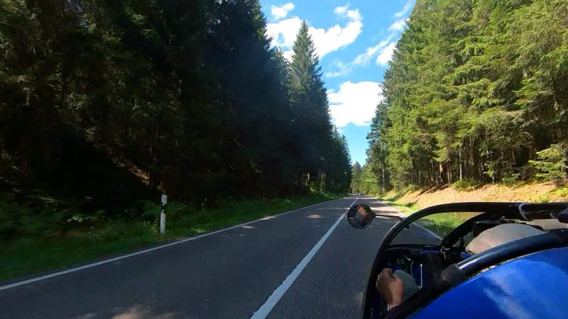TWIKE 3 on a road between trees